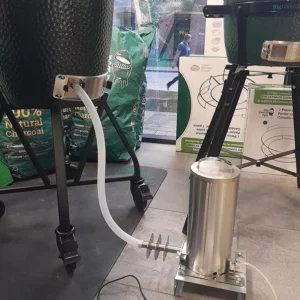 SG1 cold smoke generator connected to ceramic kamado grill for external smoke supply